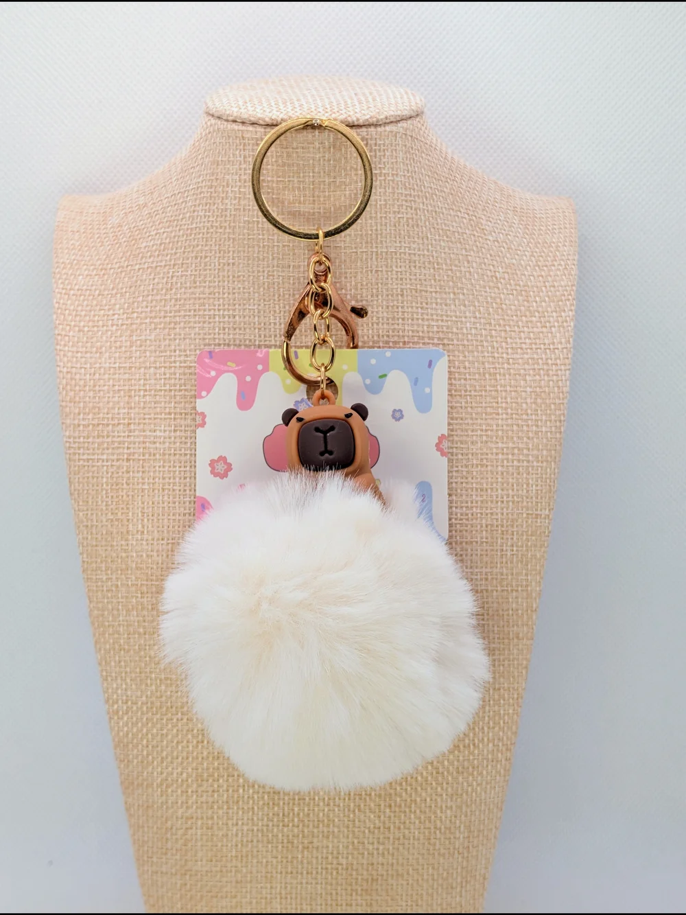 Capybara Atop Large Cream Pom Poof Keychain Bag Charm